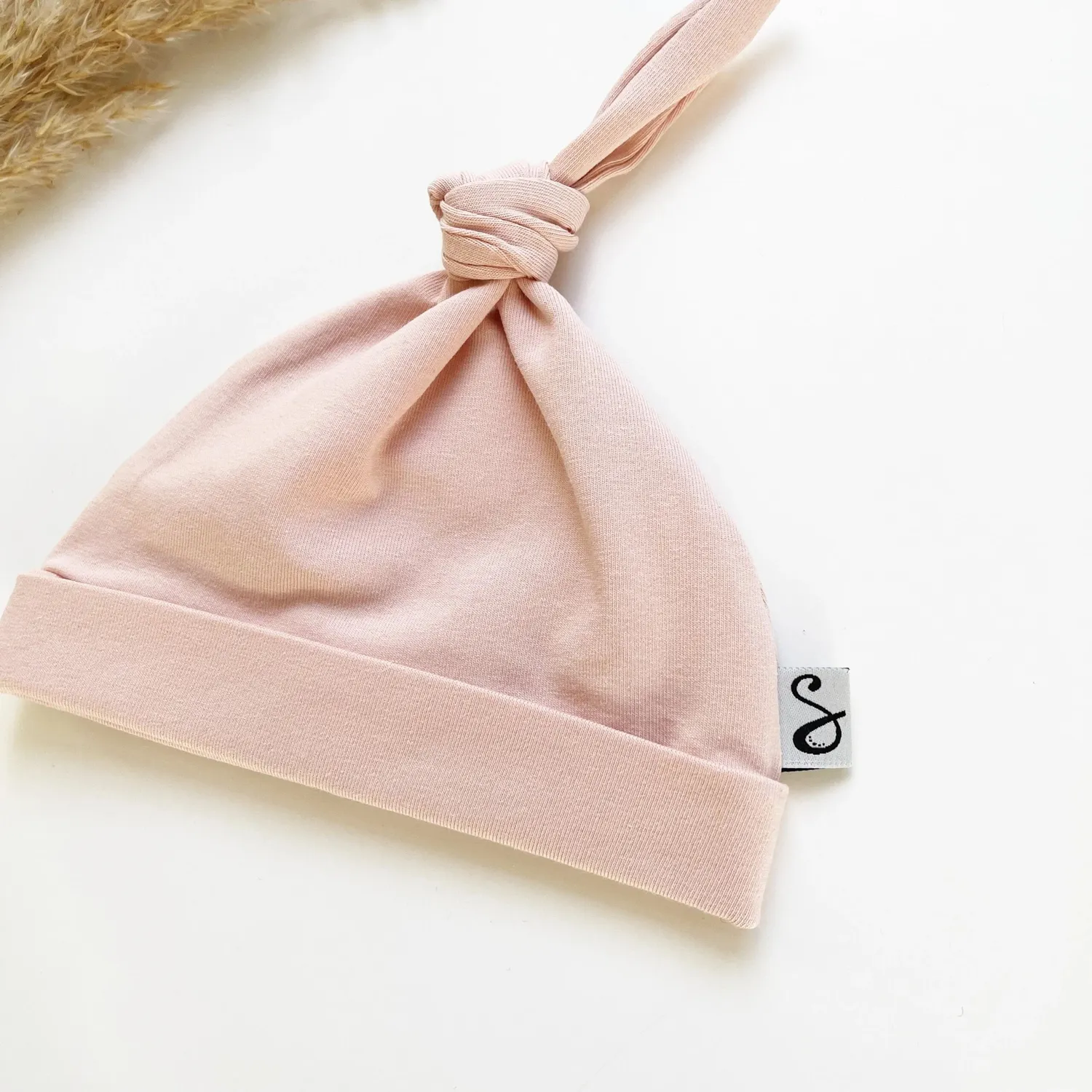 SODA FASHION Basic knoopmuts roze biokatoen