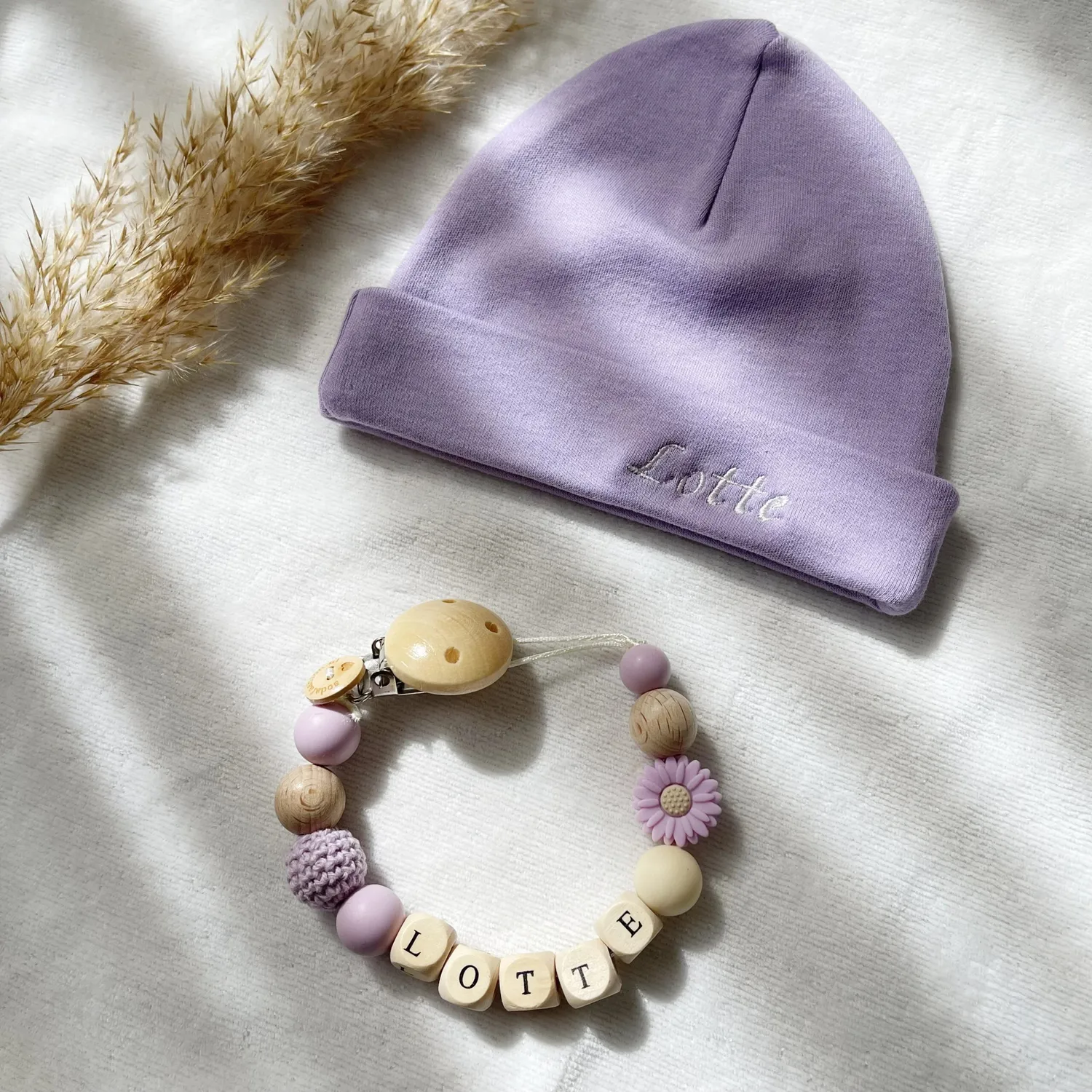 SODA FASHION Newborn muts lila biokatoen
