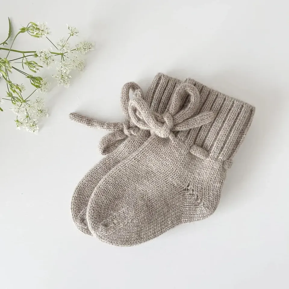 SODA FASHION Merino wol sloffen Neutral baby